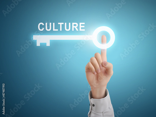male hand pressing culture key button