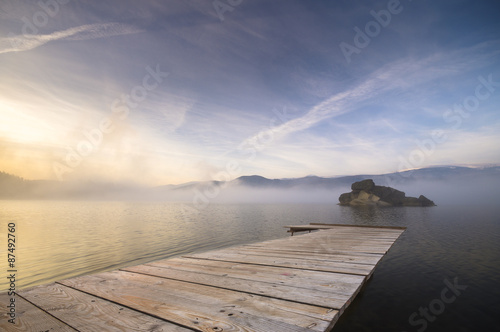 Morning fog over a mountain lake © Mike Mareen