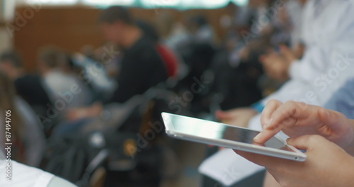 Wallpaper Mural Woman doctor using touch pad on medical conference Torontodigital.ca