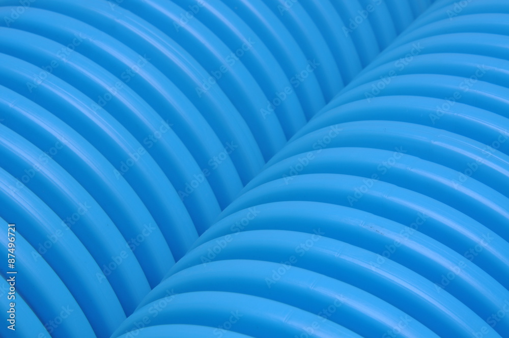 Obraz premium Blue curvilinear tubes for industry