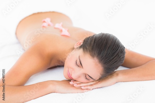 Beautiful blonde enjoying a cream massage 