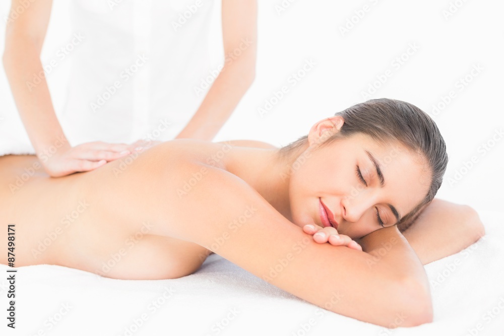 Pretty brunette enjoying a massage Pretty brunette enjoying a massage
