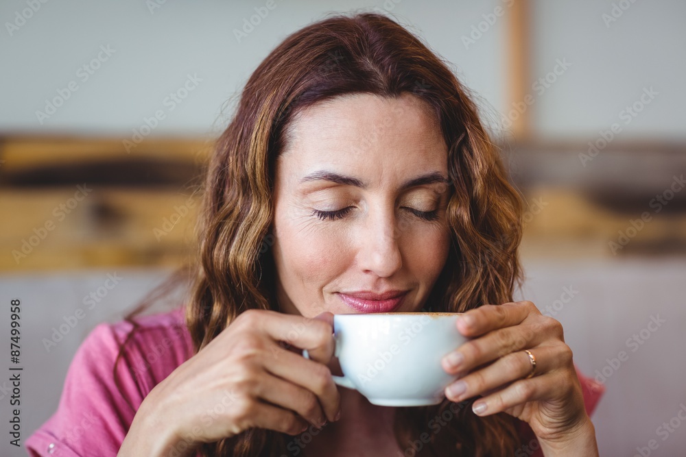 Young woman having a coffee Young woman having a coffee