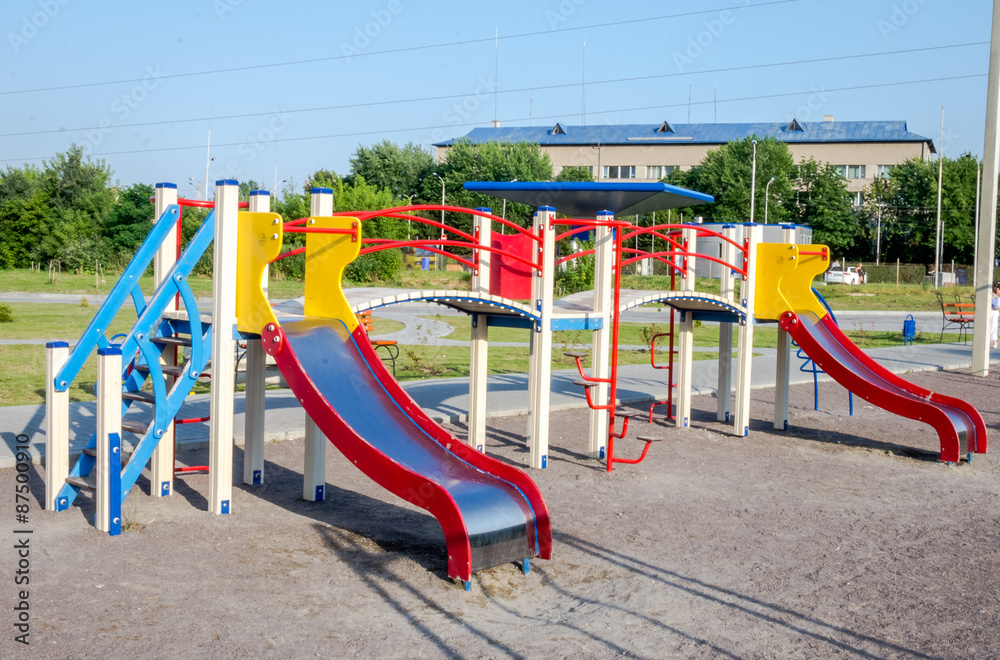 Slides on a swing at an amusement park on the playground Slides on a swing at an amusement park on the playground