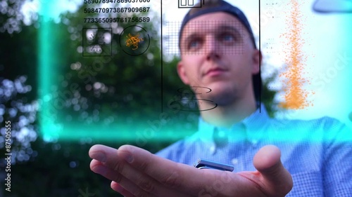 Futuristic Hologram Interface  on Device. Virtual Hi-Tech photo