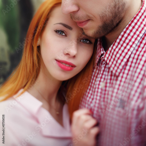 cute romantic gentle beautiful redhead stylish girl and her boyf photo