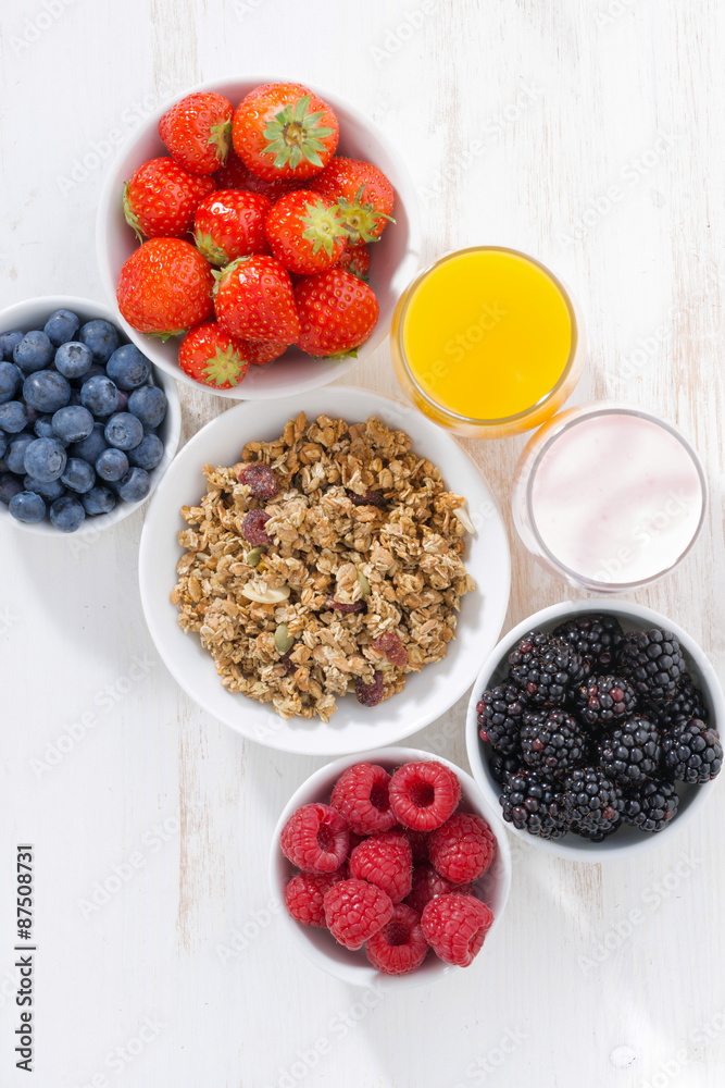 fresh berries, granola, juice and yogurt fresh berries, granola, juice and yogurt