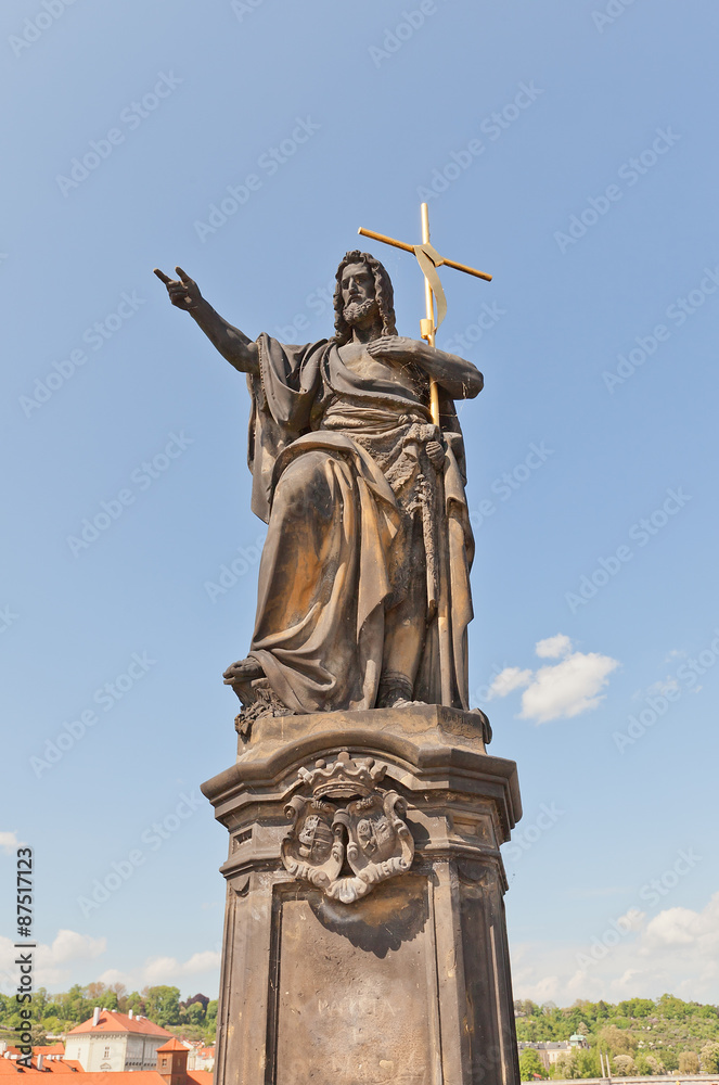 Statue of St. John the Baptist on Charles Bridge in Prague