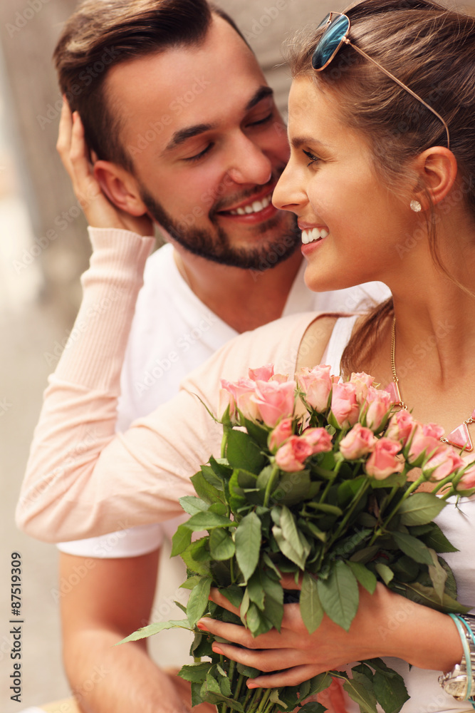 Young romantic couple with flowers Young romantic couple with flowers