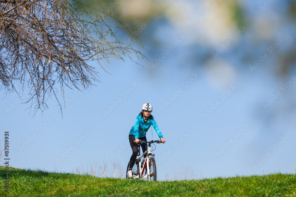Woman riding bike Woman riding bike