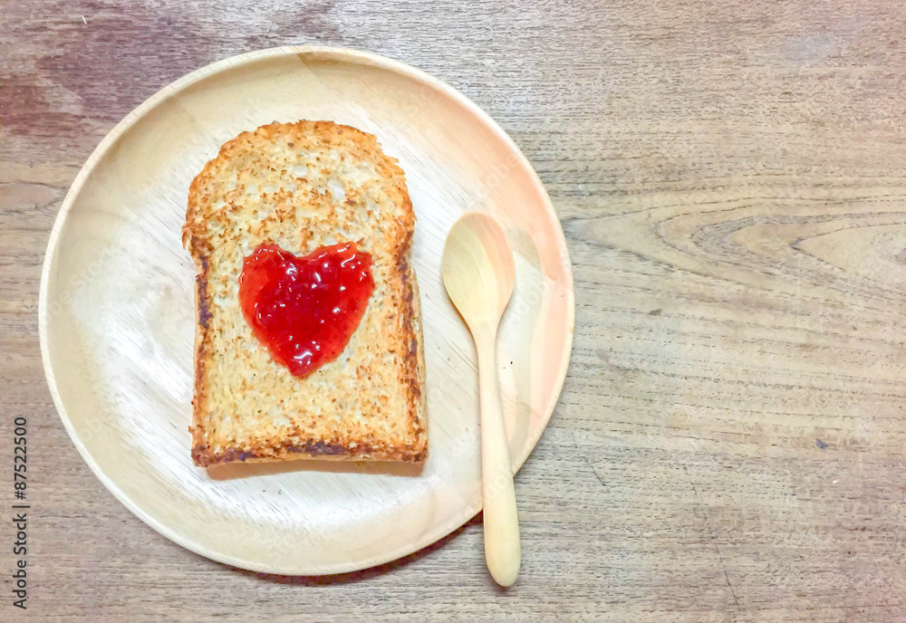 jam forming a heart on a toast
