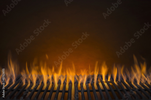 Flaming Hot Barbecue Grill and a Glowing Amber Background