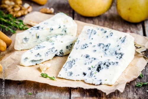 Blue cheese slices closeup photo