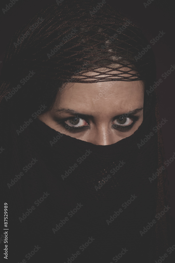 brunette woman with brown veil, Arabic young woman with green ey brunette woman with brown veil, Arabic young woman with green ey