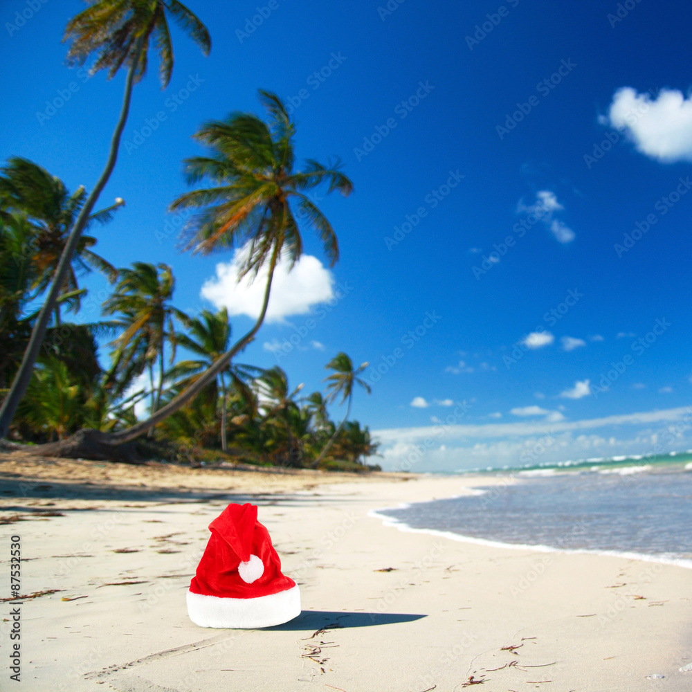 Santa hat on caribbean beach