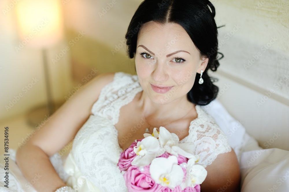 beautiful bride with a wedding bouquet of orchids beautiful bride with a wedding bouquet of orchids