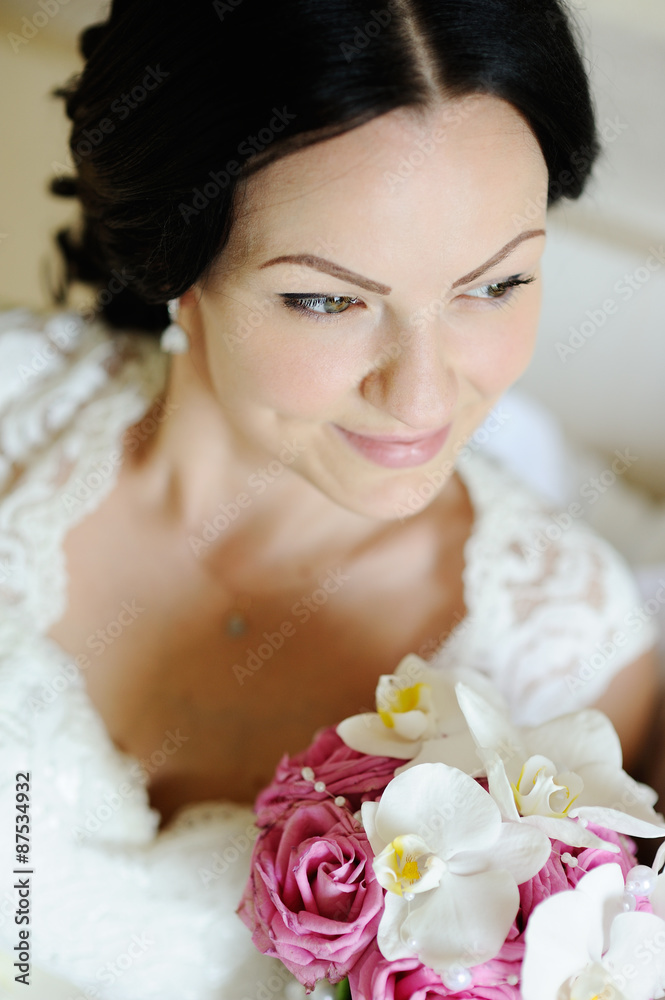 beautiful bride with a wedding bouquet of orchids beautiful bride with a wedding bouquet of orchids