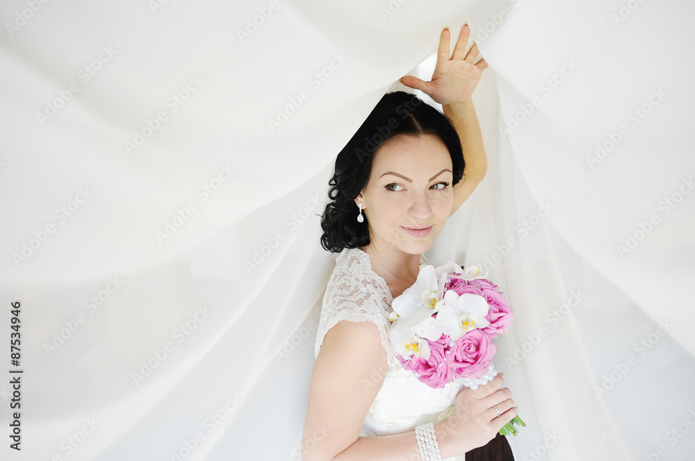 beautiful bride with a wedding bouquet of orchids beautiful bride with a wedding bouquet of orchids