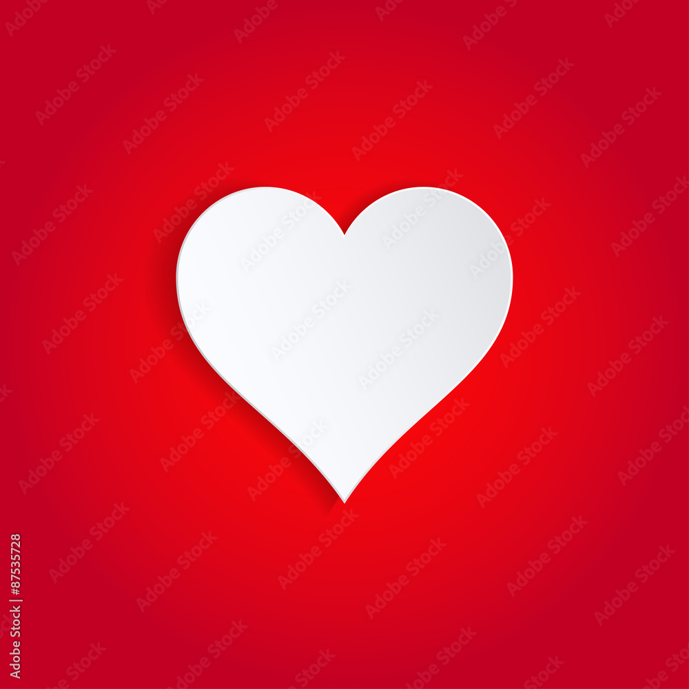 White paper heart with shadow on red background.