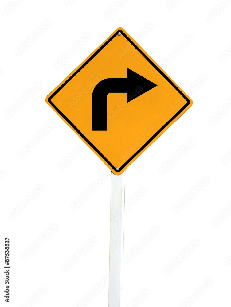 Yellow blind corner turning warning sign on a biking trail isola Yellow blind corner turning warning sign on a biking trail isola