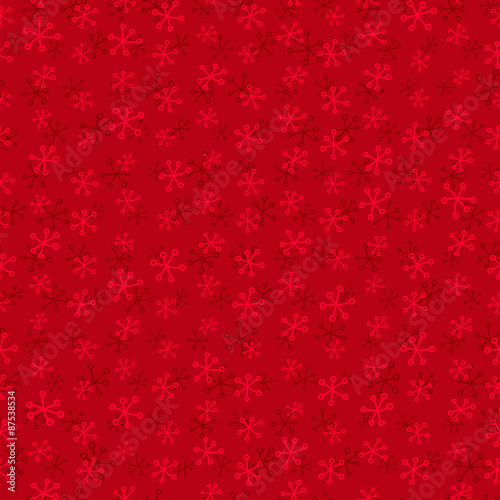 Seamless red pattern with snowflakes