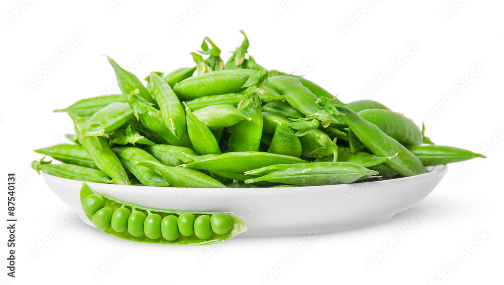 Opening and closing pea pods on white plate Opening and closing pea pods on white plate