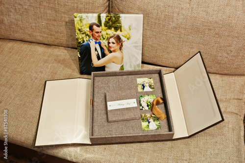 gray and brown textile velvet wedding book and album with pictur photo