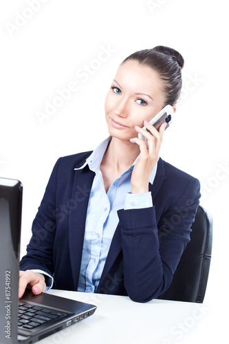 Success business woman talking on the phone