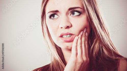 Toothache. Woman suffering from tooth pain