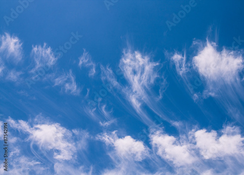 blue sky with soft clouds in the afternoon