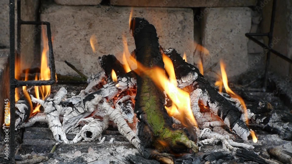 Fire Burning in a Fireplace - embers in the fireplace Fire Burning in a Fireplace - embers in the fireplace
