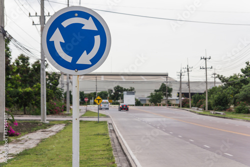 Roundabout crossroad road traffic sign 