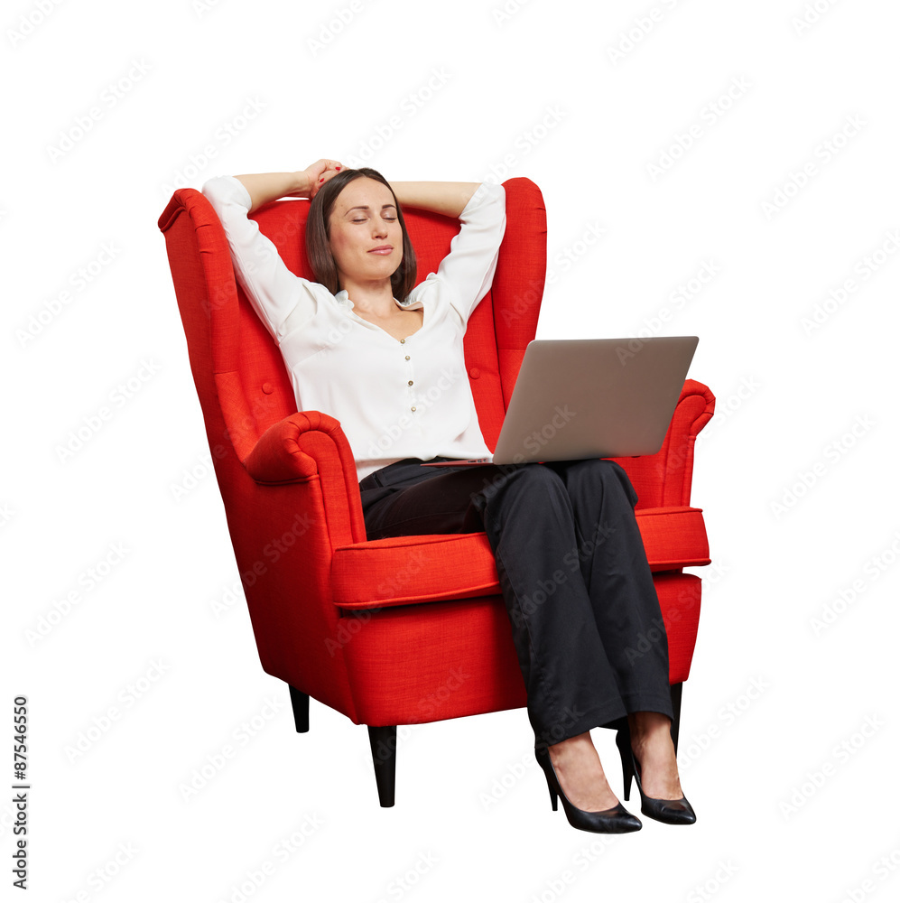 woman with laptop on the red chair