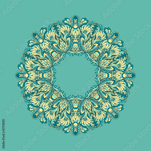 Circle ornament from doodle flowers on blue background 