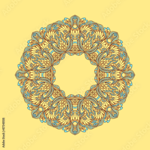 Circle ornament from doodle flowers on beige background 