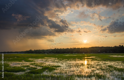 Fotografiet Sunset over a marsh