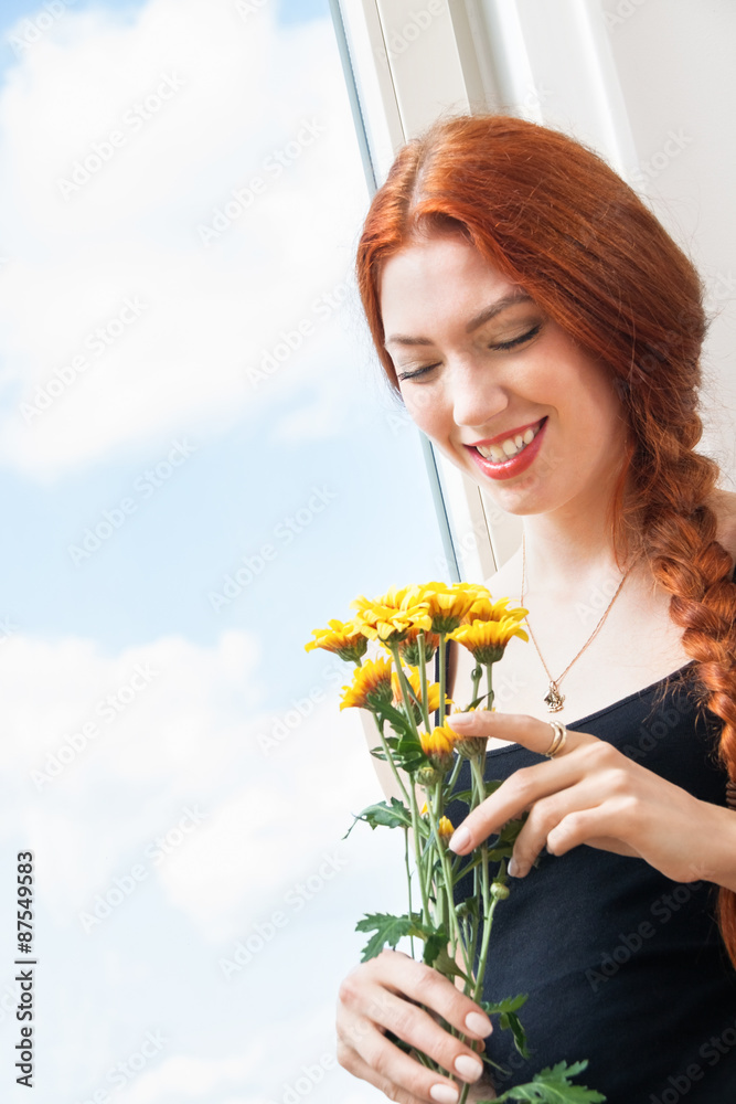 Thoughtful Woman with Flowers Leaning on Window