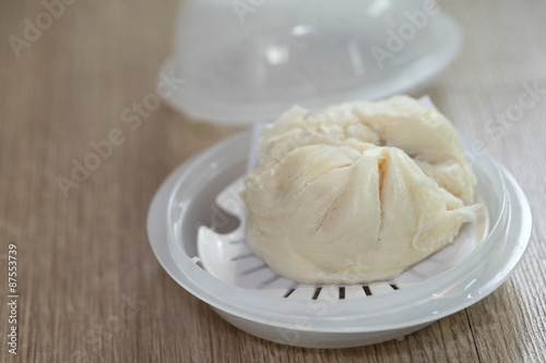Chinese dumplings being steamed on the traditional