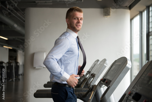 Businessman Running On Treadmill