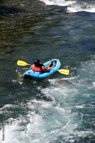 white water river rafting in a raft kayak