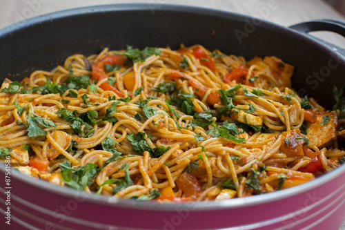 Vegan spaghetti with tofu and pepper delicious in pan