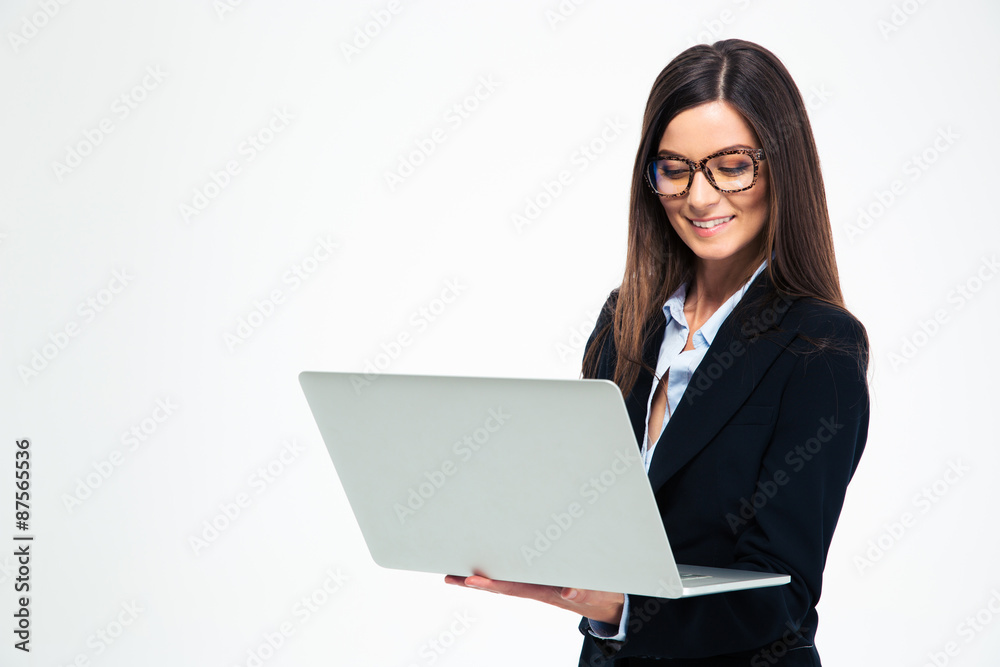 Smiling businesswoman using laptop Smiling businesswoman using laptop