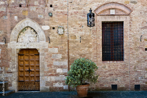 antique doorway to the Tuscan house   Siena   Italy