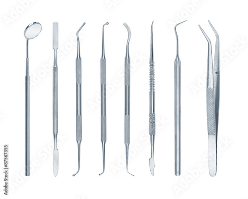 collection of dental tools isolated on white background
