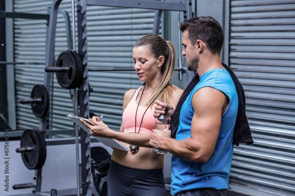 Young woman smiling with a young man