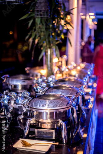 Buffet Table with Row of Food Service Steam Pans