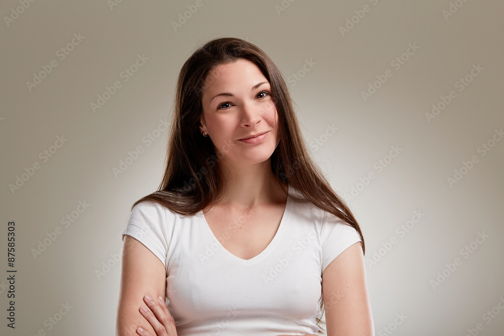 Portrait of beautiful young woman with long brunette hair Portrait of beautiful young woman with long brunette hair