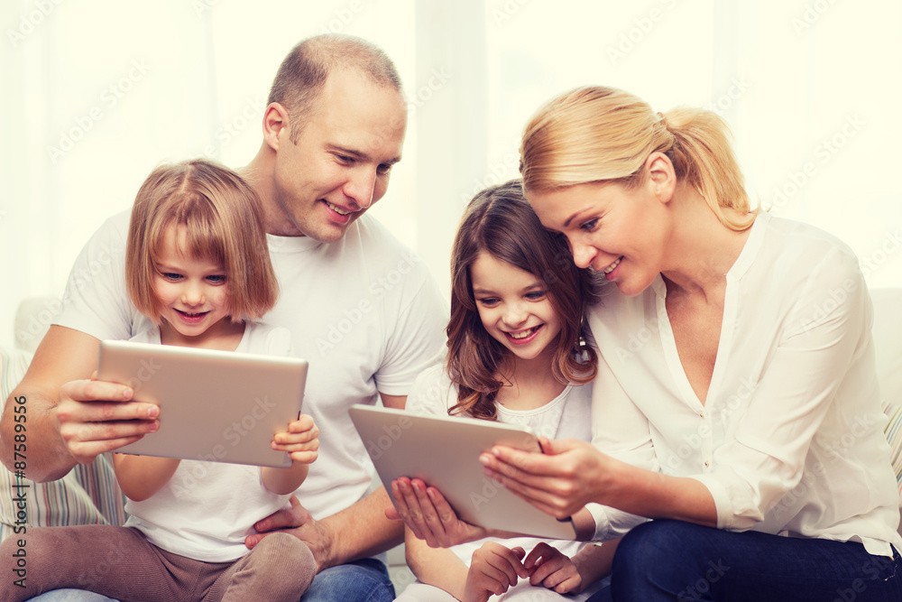 family and two kids with tablet pc computers family and two kids with tablet pc computers