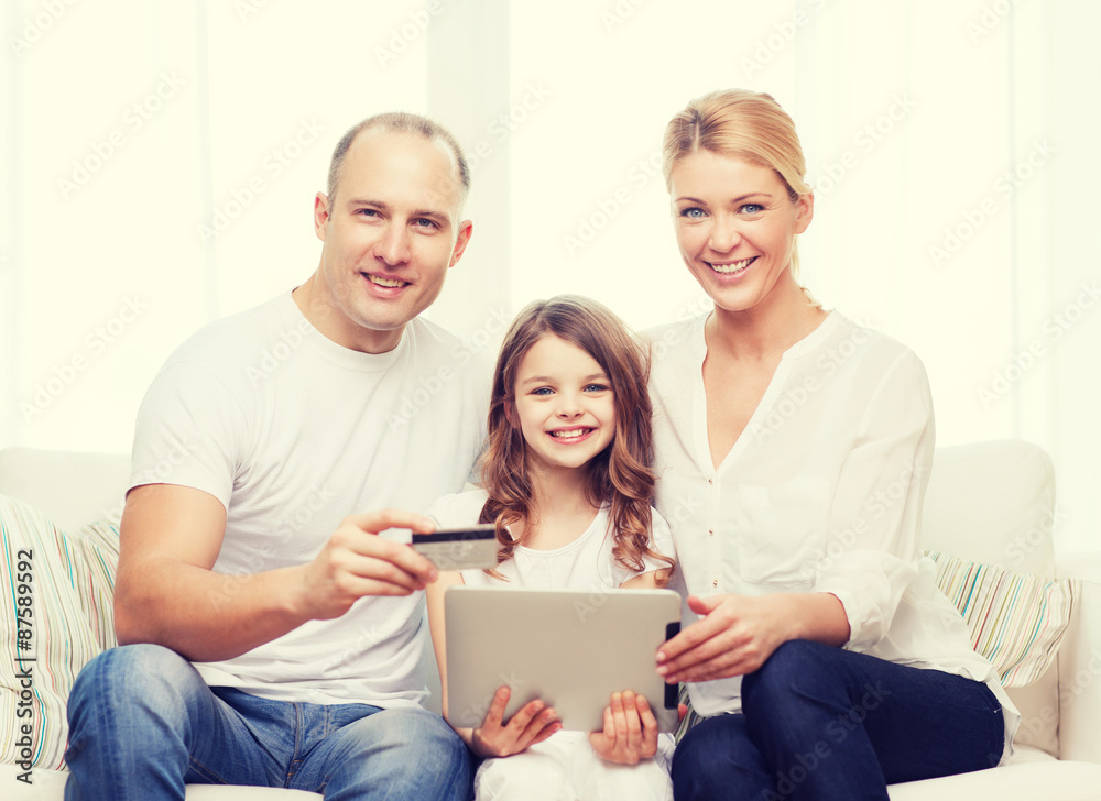 parents and girl with tablet pc and credit card parents and girl with tablet pc and credit card