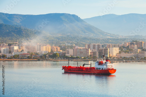 Red LPG tanker stands moored in Port of Ajaccio